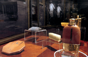 Items from Theodore Roosevelt’s toiletry case. Includes hair brush, hat brush, tooth powder holder, flask, manicure set, shaving set, shaving mirror, and jewelry case. Loan Courtesy of the National Museum of American History, Smithsonian Institution, Washington, D.C. 