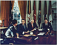 President Richard M. Nixon meets in the Oval Office with Vice President Gerald R. Ford, Secretary of State Henry A. Kissinger, and Chief of Staff Alexander Haig.
