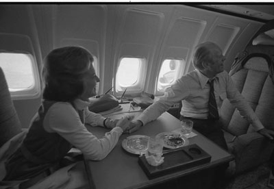First Lady Betty Ford, unaware of Sara Jane Moore’s assassination attempt, greets President Ford inside Air Force One, for the trip back to Washington.  