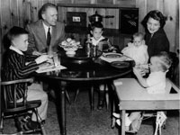 Gerald and Betty Ford and their children Mike, Jack, Susan, and Steve sit in the dining room of their home at 514 Crown View Drive, Alexandria, Virginia. 1958. 