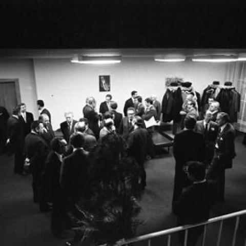 A2093-19. The American and Soviet delegations take a break  for refreshments during a long nighttime meeting. November 23, 1974.