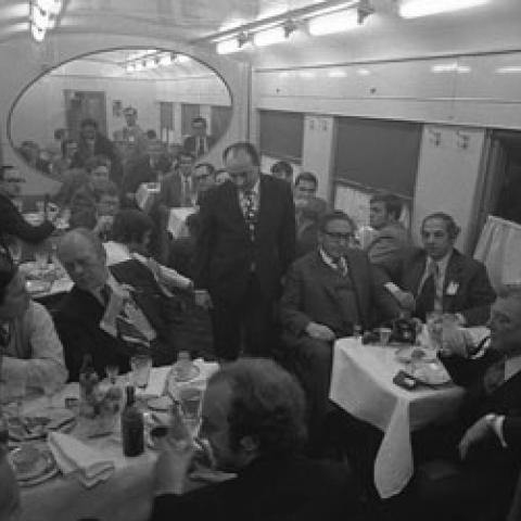 A2101-09. President Ford and his staff dine on a Soviet train enroute to Vozdvizhenka Airport, near Vladivostok, USSR.  November 24, 1974. 