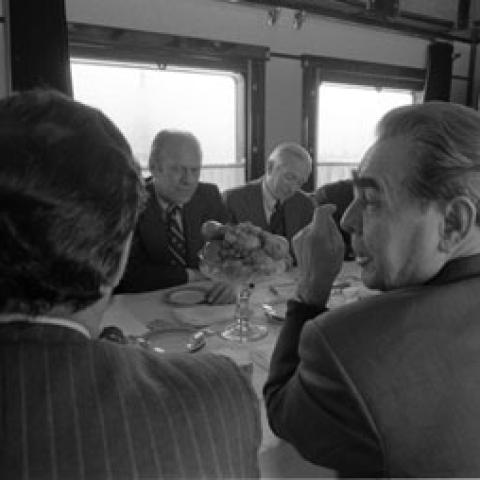 A2107-36A. The American official party and the Soviet  welcoming committee traveled by train from Vozdvizhenka Airport to the site of  the summit, Okeansky Sanatorium, near Vladivostok. . November 23, 1974.