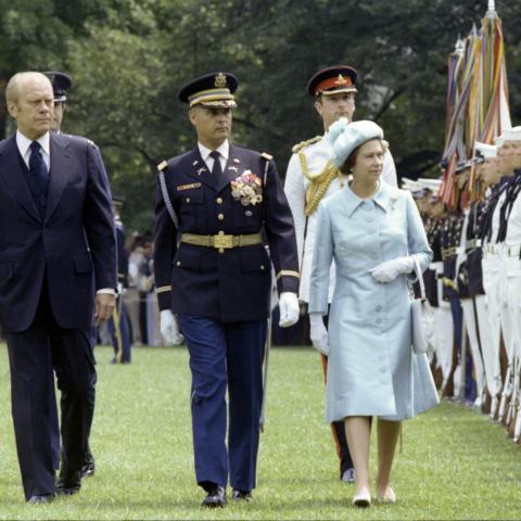President Ford and Queen Elizabeth II reviewing the Honor Guard at the state arrival ceremony in honor of the Queen on the South Lawn of the White House.  July 7, 1976.