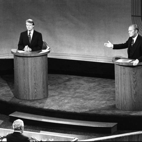 President Ford and Jimmy Carter meet at the Walnut Street Theater in Philadelphia to debate domestic policy during the first of the three Ford-Carter Debates. September 23, 1976.