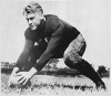 H0014-1 and H0035-3 (H0035-3 provides better reproduction). Gerald R. Ford, Jr. centers a football during practice at the University of Michigan, Ann Arbor, MI. 1933.