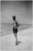 H0037-3. Gerald R. Ford, Jr. stands on the shore at Ottawa Beach, MI, site of his parent's summer cottage. 1940.