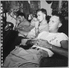 H0060-2. Crew members take a break aboard the USS MONTEREY. 1944.