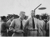 H0061-2 and H0061-3. Gerald R. Ford, Jr. and fellow officer Truman Walling at the farewell party for Air Group Thirty at the Ford Island Tennis Club, Pearl Harbor. May 12, 1944.