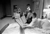 A1170-18A President and Mrs. Ford read a petition, signed by all 100 members of the United States Senate, in the President's Suite at Bethesda Naval Hospital, Bethesda, MD, following the First Lady's breast cancer surgery. October 2, 1974.