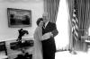 A2328-18A - President and Mrs. Ford hug each other in the Oval Office. December 6, 1974.