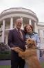 A4455-31A. President and Mrs. Gerald R. Ford pose on the South Lawn of the White House with  Liberty, their pet golden retriever.  May 9, 1975.