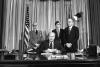 A9259-15. President Ford makes remarks upon signing emergency appropriations legislation for the National Swine Flu Immunization Program. April 15, 1976.