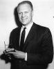 AV82-18-0809. Representative Gerald R. Ford, Jr., poses with his Sports Illustrated Silver Anniversary Award.Representative Gerald R. Ford, Jr., poses with his Sports Illustrated Silver Anniversary Award. December 21, 1959