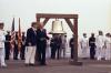 B0493-15 - President Ford initiates the ringing of Bicentennial bells across the nation while on the flight deck of the USS Forrestal with Bicentennial Administration head John Warner in observance of Operation Sail activities in New York Harbor. July 4, 1976.
