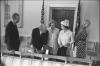 B0547-22. Queen Elizabeth II and Prince Philip present state gifts to President Ford, Mrs. Ford, and Susan Ford in the Yellow Oval Room. July 7, 1976.