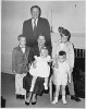 H0006-4. The Ford family poses in front of the fireplace at 514 Crown View Drive, Alexandria, VA. 1959.