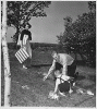 H0009-2. Betty Ford watches as Gerald R. Ford, Jr., plays with Michael Ford outside their apartment at 1521 Mount Eagle Place, Alexandria, VA. 1952.