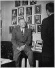 H0011-3. Representative Gerald R. Ford, Jr., talks to an unidentified visitor in his House Office. 1950.