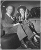H0013-2. Gerald R. Ford, Jr., and Betty Ford sit in the back seat of an automobile outside of Grace Episcopal Church in Grand Rapids, MI, following their marriage. October 15, 1948.