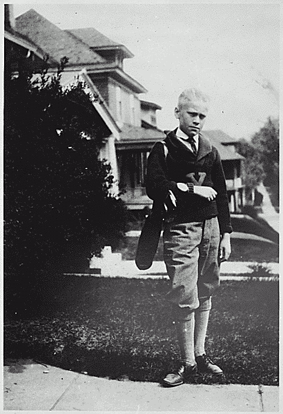 H0014-2, H0030-3, H0030-4, and H0041-3 (H0041-3 provides the best reproduction). Gerald R. Ford, Jr. stands in front of his home at 649 Union Street, SE, Grand Rapids, MI in golf attire. 1924.