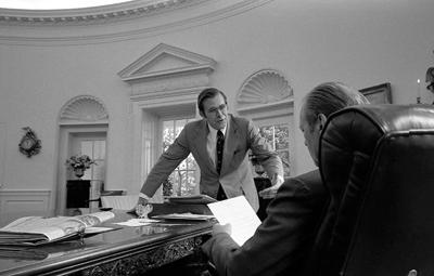 A1110-28A President Ford and Chief of Staff Donald Rumsfeld in the Oval Office. September 29, 1974.