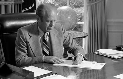 A5136-03 - President Ford signs his Crime Message to Congress. June 19, 1975.