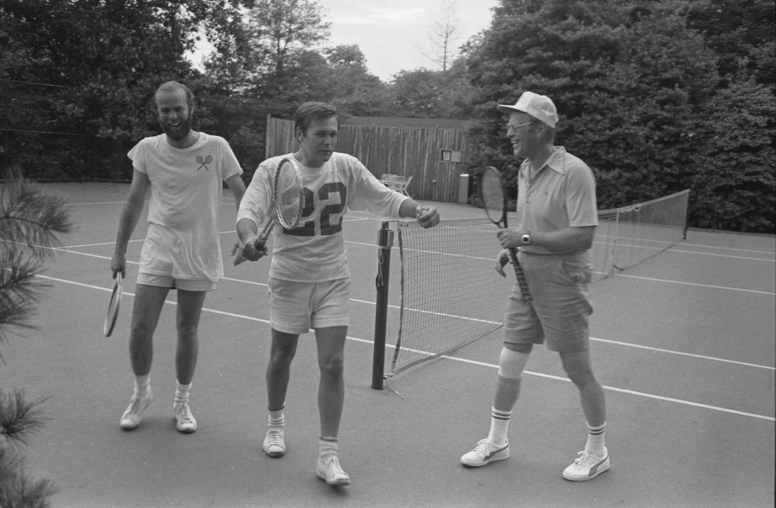 A5564-04. President Ford, Chief of Staff Donald Rumsfeld, and David Kennerly, Personal Photographer to the President, following a tennis match on the White House Tennis Courts.  July 16, 1975.  