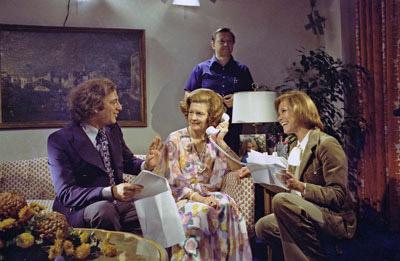 A7323-16. Co-producer Ed Weinberger coaches First Lady Betty Ford and Mary Tyler Moore during the filming of a Mary Tyler Moore Show episode in which Mrs. Ford played herself.  Hay-Adams Hotel, Washington, D.C.  CBS television aired the episode on January 10, 1976.  November 17, 1975.  