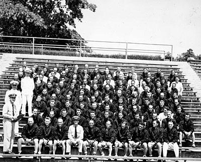 AV82-18-0035. Gerald R. Ford with a large group of naval officers, Chapel Hill, North Carolina. ca. 1943