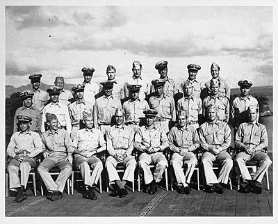 AV82-203-15. Gunnery Officers on board the USS MONTEREY, October 24, 1943. Gerald R. Ford is the second person from the right in the front row. 