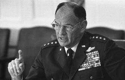 B0260-23. Chairman of the Joint Chiefs of Staff General George S. Brown makes a point at a meeting discussing the situation in Lebanon.  June 17, 1976. 