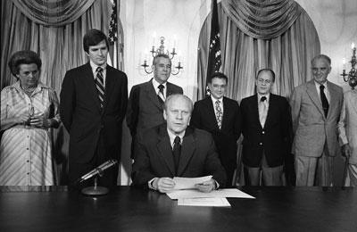 B1030-07A. President Ford makes remarks prior to signing S.3735, authorizing the 1976 National Swine Flu Immunization Program.  August 12, 1976. 