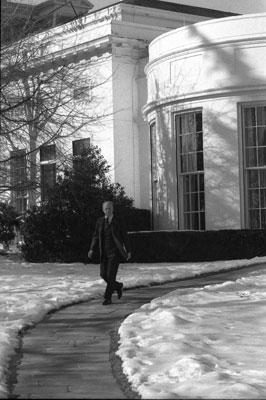 B2820-07. President Ford departs the Oval Office for an event at the National War College.  January 18, 1977. 