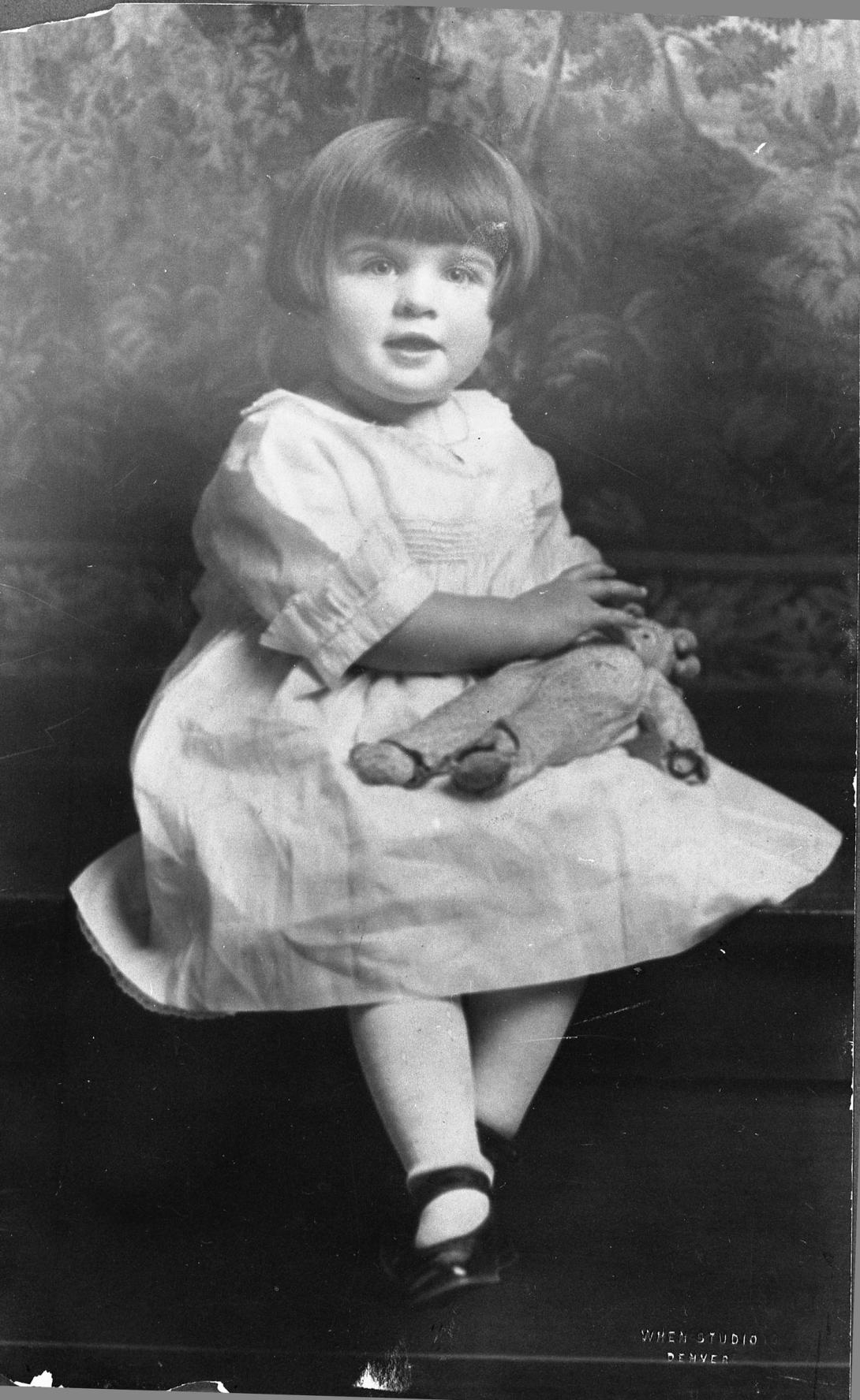 H0004-4. Elizabeth Ann "Betty" Bloomer, age 3, with her teddy bear. April 1921.