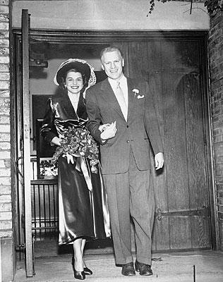 H0013-01. Gerald R. Ford, Jr., and Betty Ford walk out of Grace Episcopal Church in Grand Rapids, MI, following their marriage. October 15, 1948
