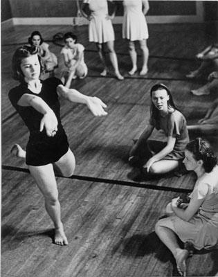 H0069-1. Betty (front left) in a Bennington College Summer School of Dance class taught by Martha Hill (right center). Bennington, Vermont. 1937.