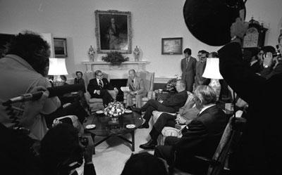 A4947-05. President Ford participates in a ceremony to receive the Report of the Commission on CIA Activities within the United States (Rockefeller Commission) from Vice President Nelson A. Rockefeller and the committee members.   June 6, 1975.