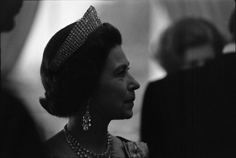 B0585-16A. Queen Elizabeth II attending a reception in the Yellow Oval Room prior to a state dinner held in her honor.  July 7, 1976. 