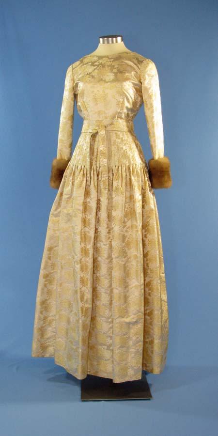 Ivory gown with fur cuffs