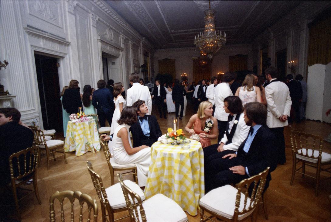 38-WHPO-A4765-10. Susan Ford sitting with classmates and their dates during the Holton-Arms School Senior Prom, 5/31/1975.