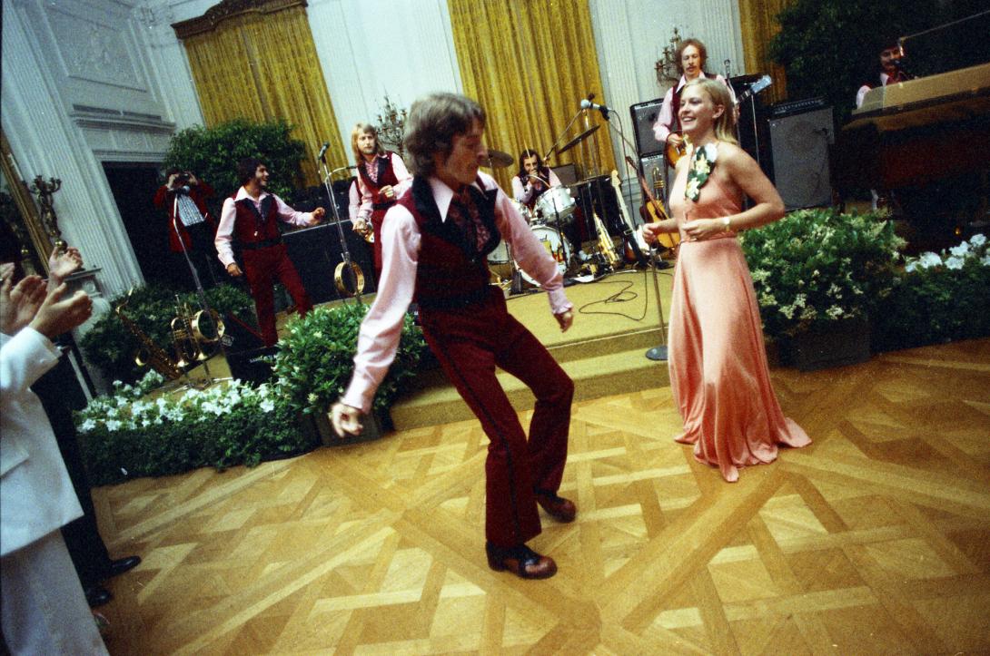 38-WHPO-A4766-10A. Susan Ford dancing with Sandcastle band member Billy Etheridge at the Holton-Arms School Senior Prom, 5/31/1975.
