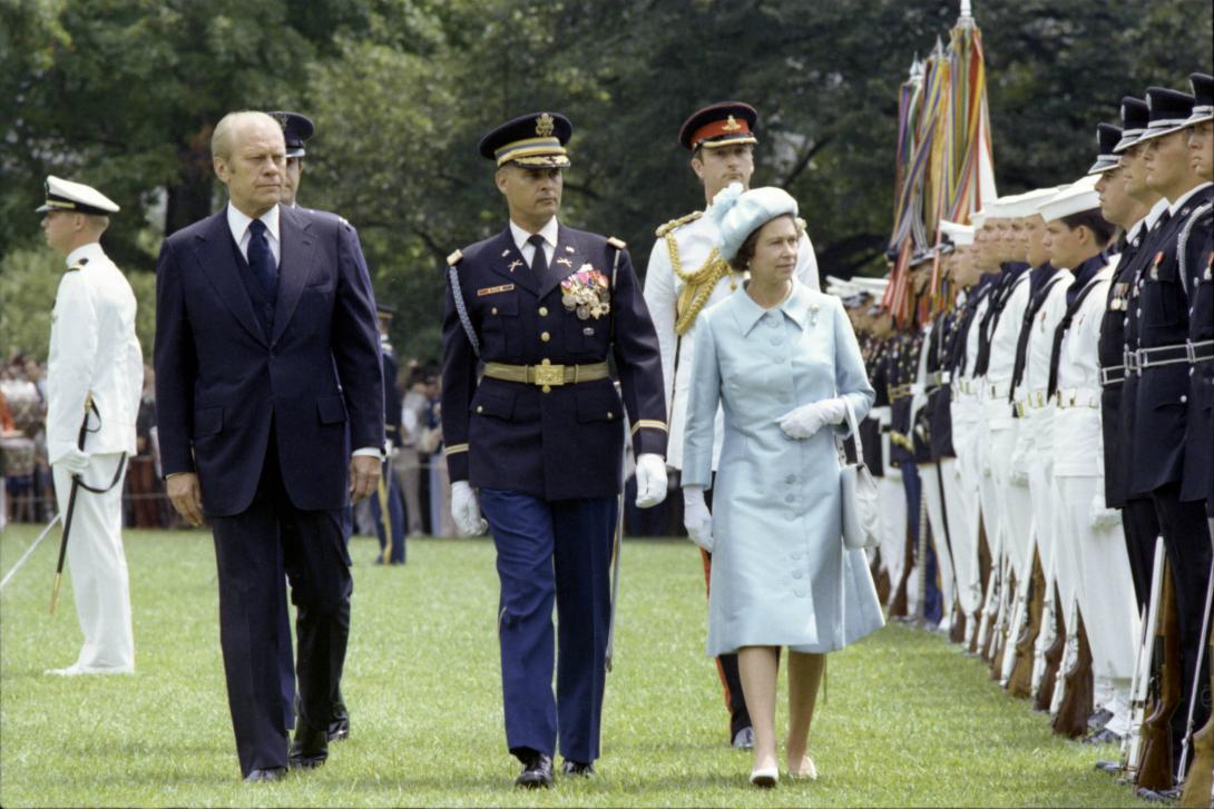 B0531-09. President Ford and Queen Elizabeth II reviewing the Honor Guard at the state arrival ceremony in honor of the Queen on the South Lawn of the White House.  July 7, 1976.