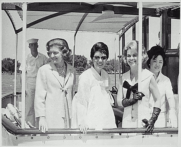 H0002-3. Betty Ford and three unidentified women aboard a naval launch at Pearl Harbor, HI. December 4, 1968.