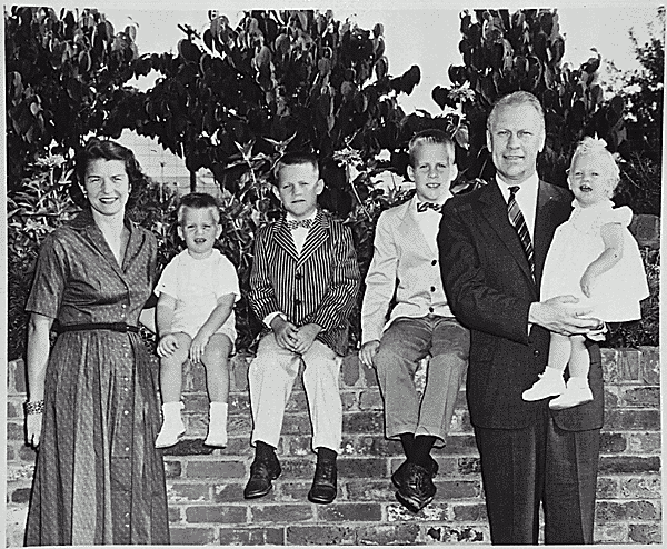 H0008-3. The Ford family poses in the back yard of their home at 514 Crown View Drive, Alexandria, VA. 1959.