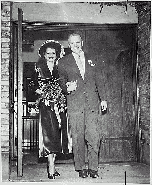 H0013-1. Gerald R. Ford, Jr., and Betty Ford walk out of Grace Episcopal Church in Grand Rapids, MI, following their marriage. October 15, 1948.
