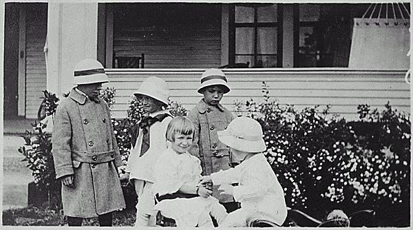 H0021-3. Gerald R. Ford, Jr. (then known as Leslie Lynch King, Jr.) plays in front of his house with his cousins Gardner and Adele James and two unidentified girls. 1915.