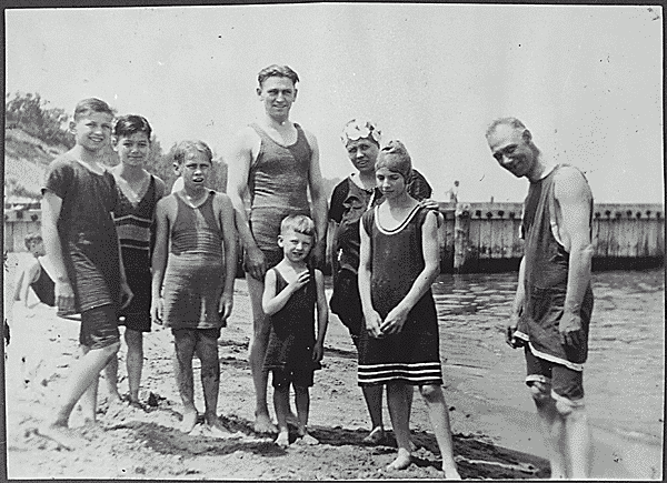 H0028-4. Gerald R. Ford Jr. poses with his parents, half-brother Tom Ford, cousin Gardner James and several other relatives on the sand at Ottawa beach, MI. 1922