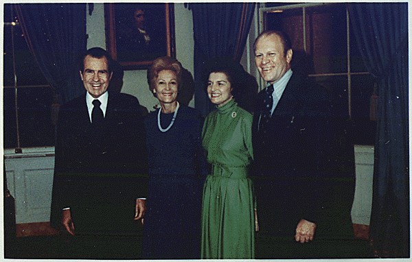 H0033-1. President and Mrs. Richard M. Nixon with Representative and Mrs. Gerald R. Ford in the Blue Room following the nomination of Gerald Ford as the President's choice to succeed Spiro T. Agnew as Vice President. October 12, 1973.