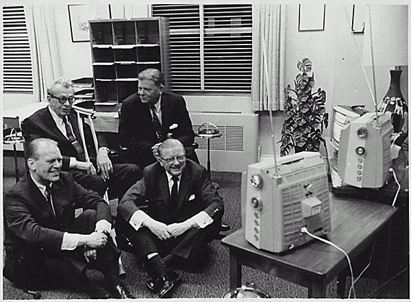  H0036-2. Representative Gerald R. Ford, Senator Everett M. Dirksen, Ray Bliss and Thruston Morton watch election returns on several televisions in an unidentified office. November 8, 1966.